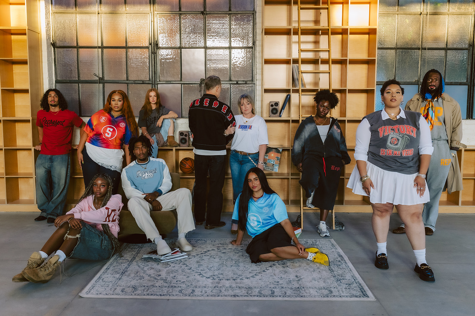 Group wearing Represent and V5 merch